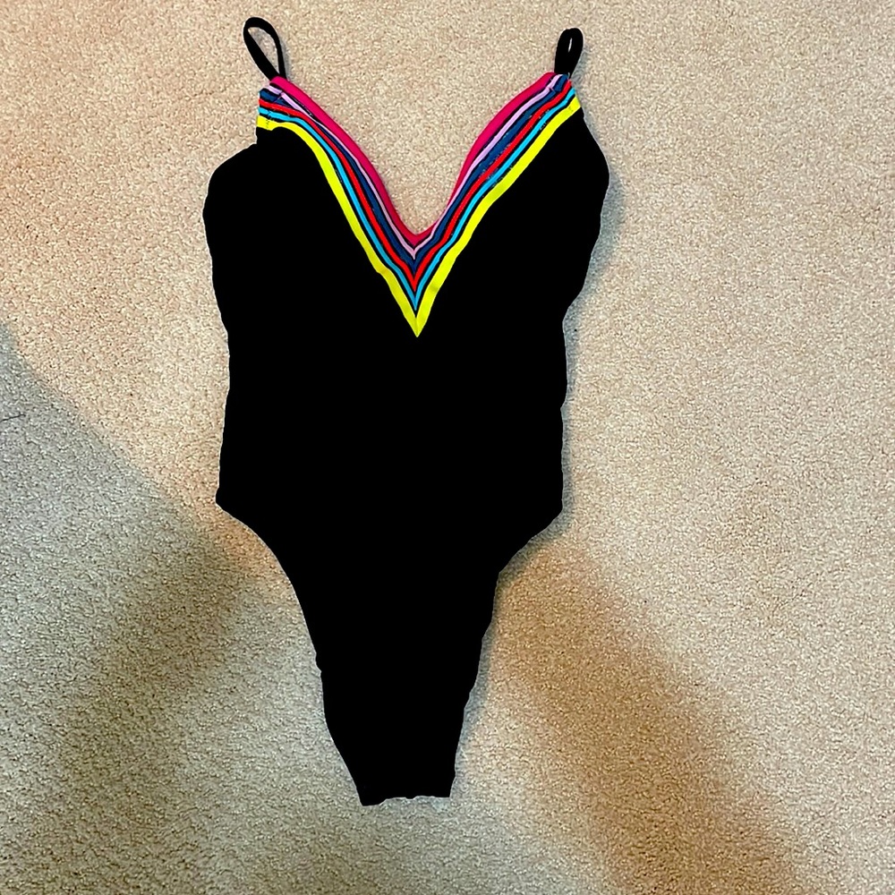 Black multi colored v neck one piece Trina Turk Victoria’s Secret suit.
